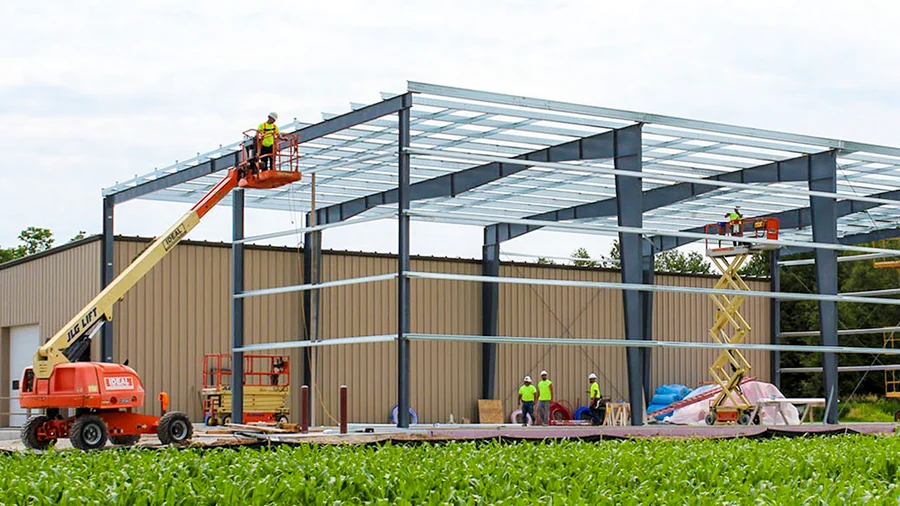 Construction process of a pre-engineered steel Butler Building.